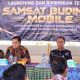 Kepala Bapenda Jawa Tengah Muhamad Masrofi bersama Plt Bupati Pekalongan Sukirman acara peluncuran Samsat Budiman Mobile di Balai Desa Kalijambe, Sragi, Kabupaten Pekalongan, Jumat, 9 Oktober 2026 (foto: Pemprov Jateng)