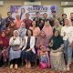 Narasumber dan para peserta acara temu wicara berfoto bersama setelah kegiatan.